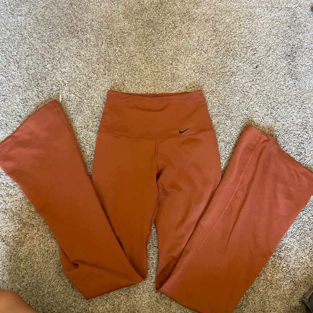 NIKE BURNT ORANGE YOGA PANTS